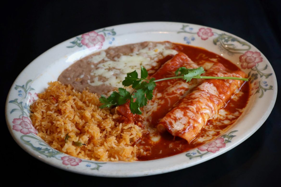 Veggie enchiladas: Two corn tortillas stuffed with mushrooms, carrots, celery and peas topped with our original carrot pure and “Ranchero” cheese served with rice and beans.